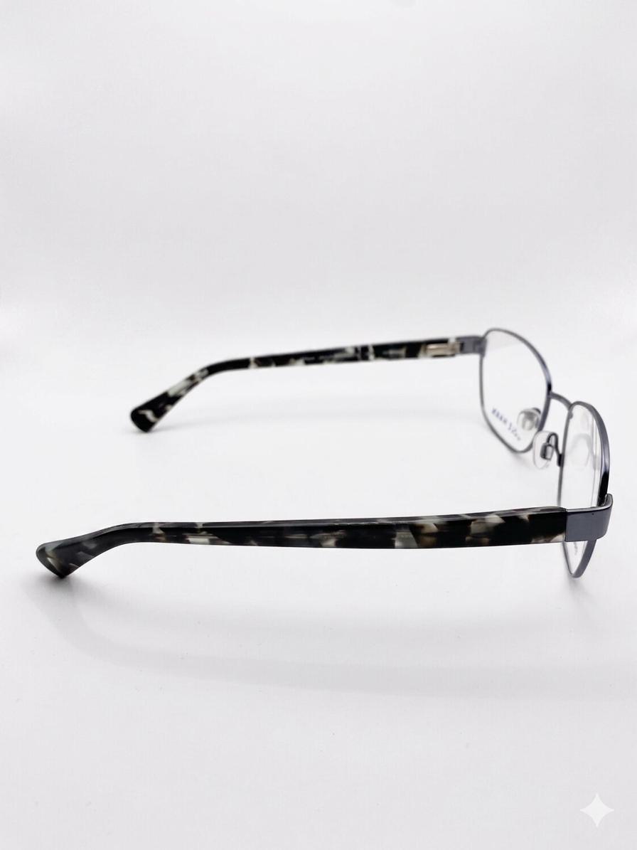 Cole Haan: Elegancia Arquitectónica en Acero Inoxidable
