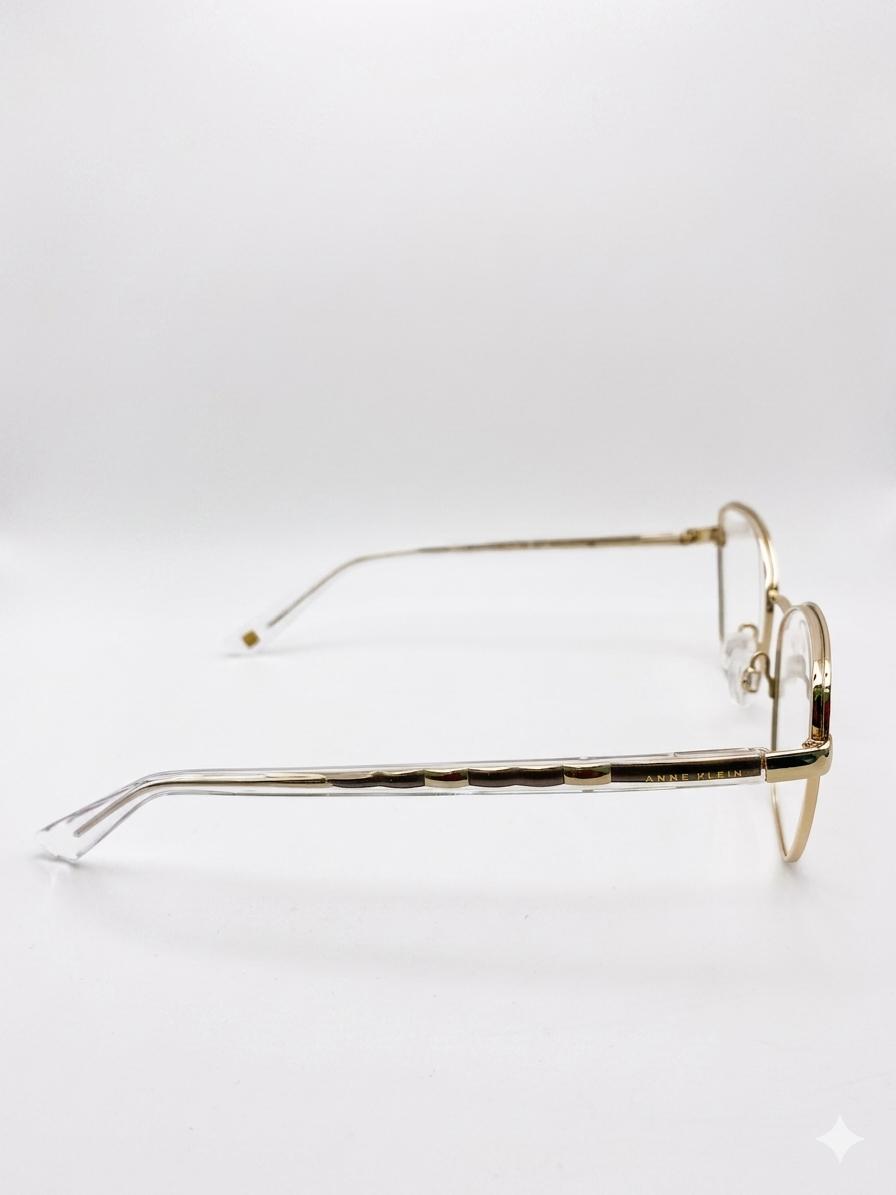 Gafas Oftálmicas Anne Klein – Montura Femenina de Acero Inoxidable Estilo Cat-Eye en Oro Brillante con Varillas de Diseño