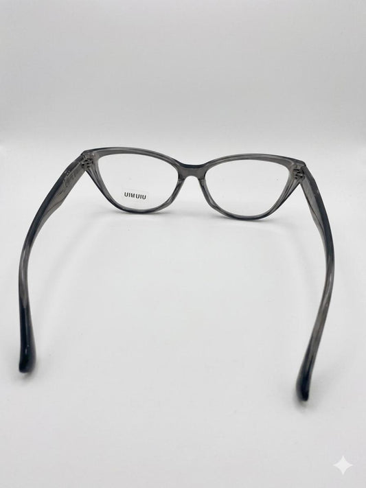 Gafas de Vista Miu Miu – Montura Cat-Eye Transparente Gris con Logo Dorado