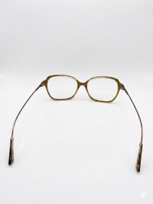 Gafas de Vista Elegantes en Tono Marrón Translúcido y Patillas de Metal Fino