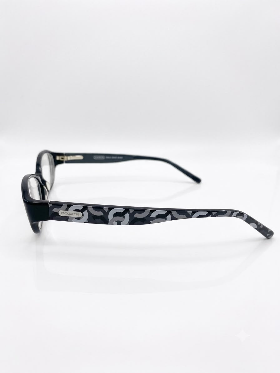 Lentes Ópticos Coach - Negros con Patillas Estampadas