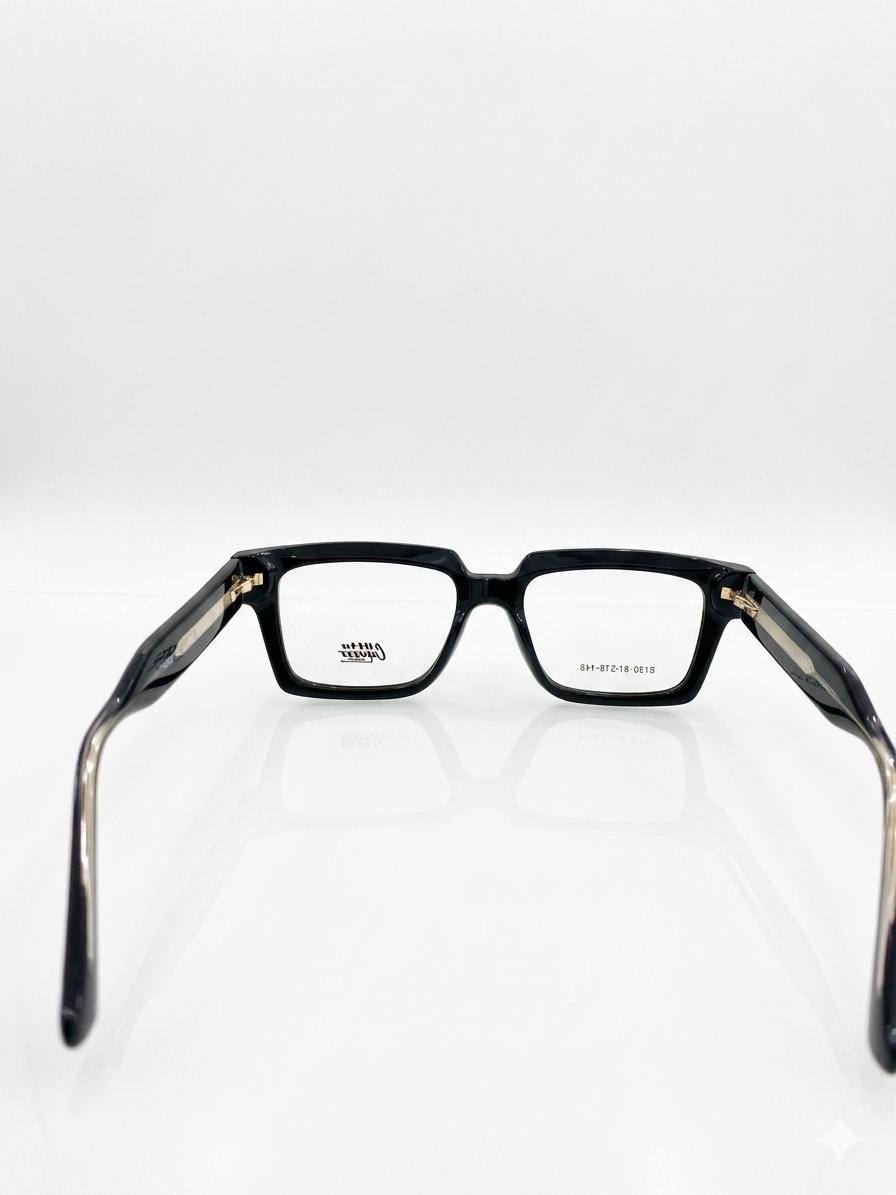 Lentes Otta Capuzzo - Modelo 8730: Elegancia Rectangular en Negro Sólido