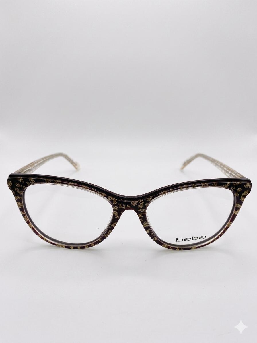Montura Bebe Eyewear – Cat-Eye Elegante con Destellos Dorados