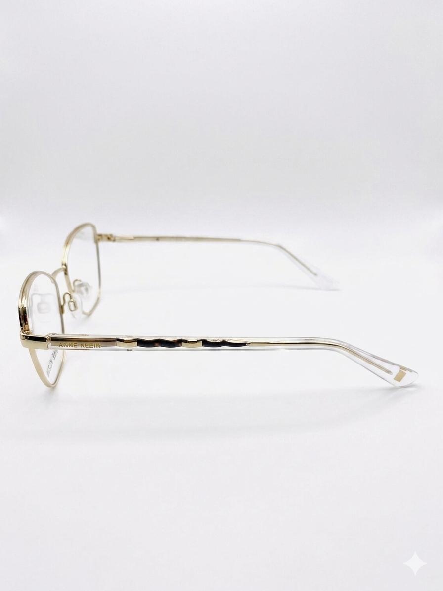 Gafas Oftálmicas Anne Klein – Montura Femenina de Acero Inoxidable Estilo Cat-Eye en Oro Brillante con Varillas de Diseño