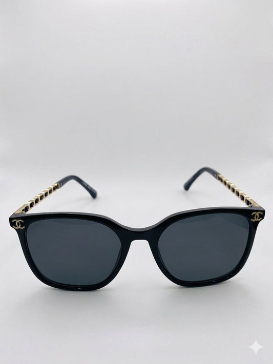 Gafas de Sol Chanel Cuadradas Negras con Patillas de Cadena Entrelazada Oro