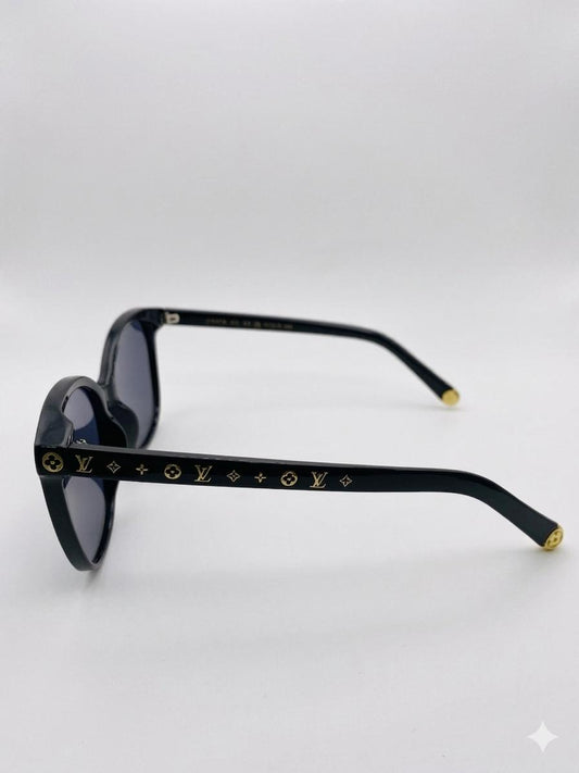 Gafas de Sol Louis Vuitton Cat-Eye en Acetato Negro con Detalles Monograma en Dorado