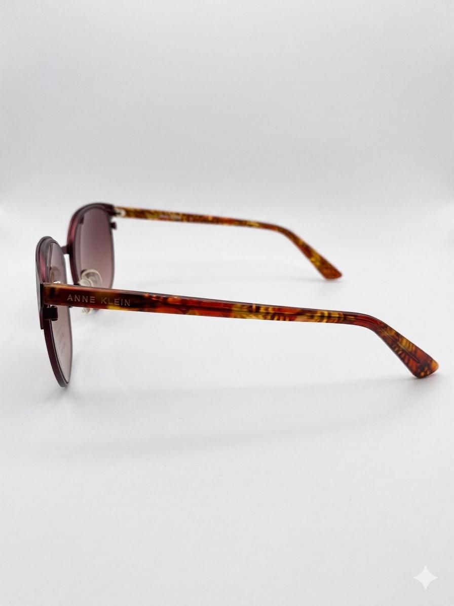Gafas de Sol Anne Klein para Mujer – Estilo Cat-Eye Marrón Degradado y Patillas Carey