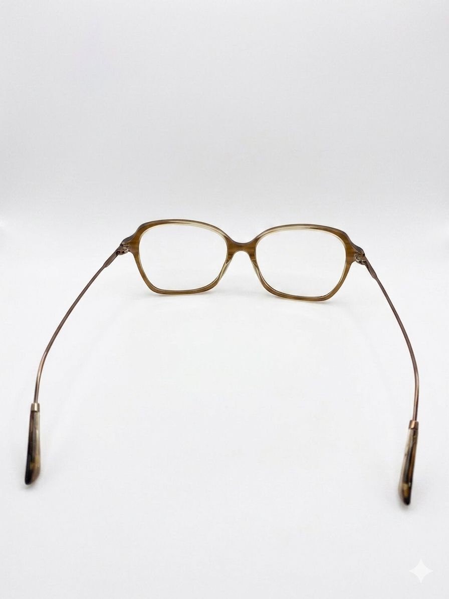 Gafas de Vista Elegantes en Tono Marrón Translúcido y Patillas de Metal Fino