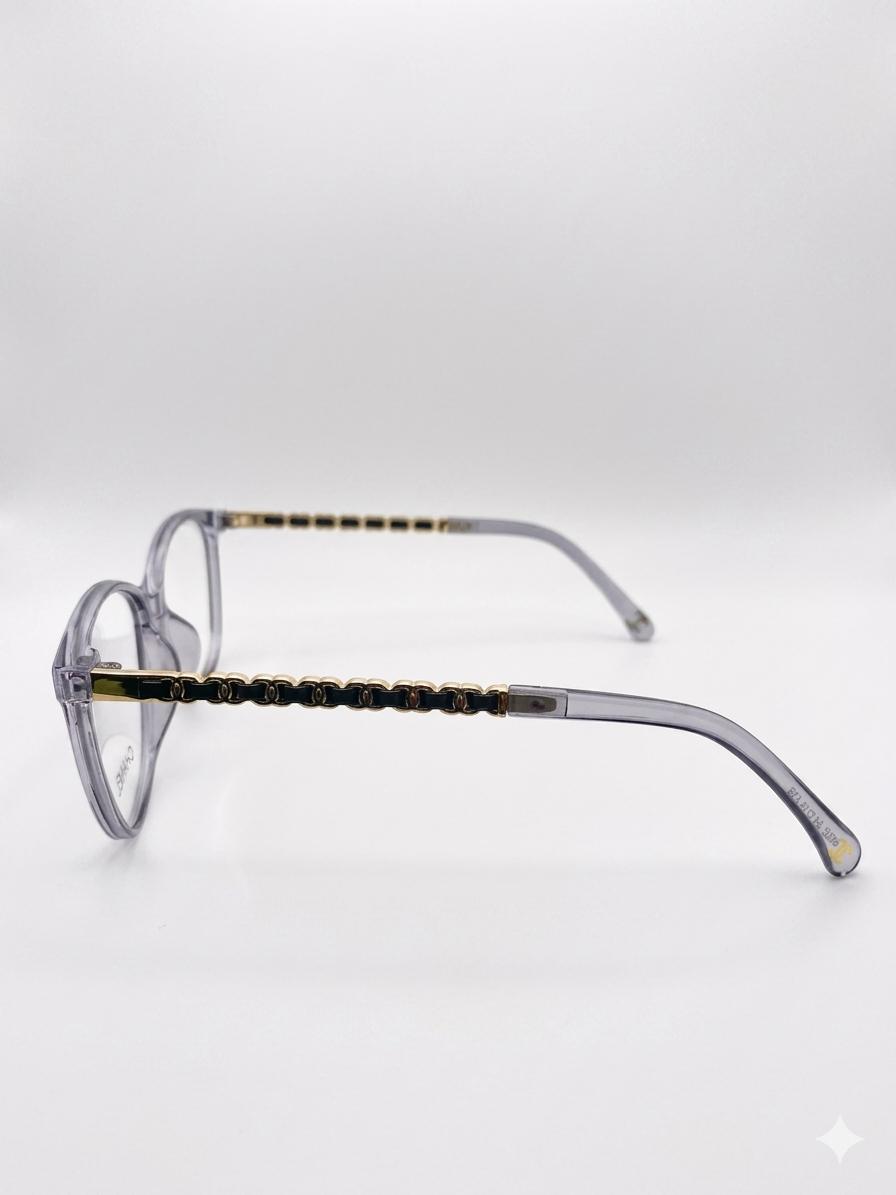 Montura Ofálmica Chanel – Transparente Grisácea con Detalles en Cadena Dorada