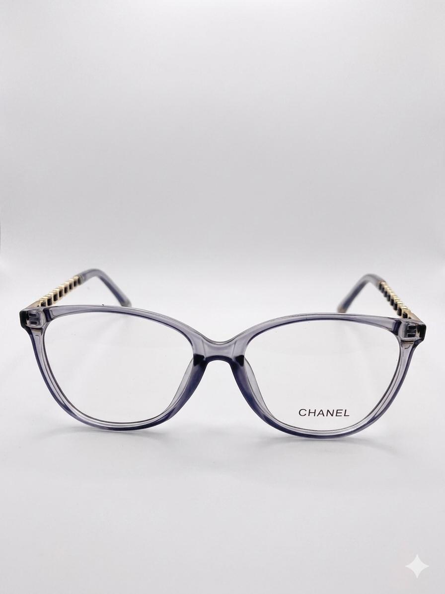 Montura Ofálmica Chanel – Transparente Grisácea con Detalles en Cadena Dorada