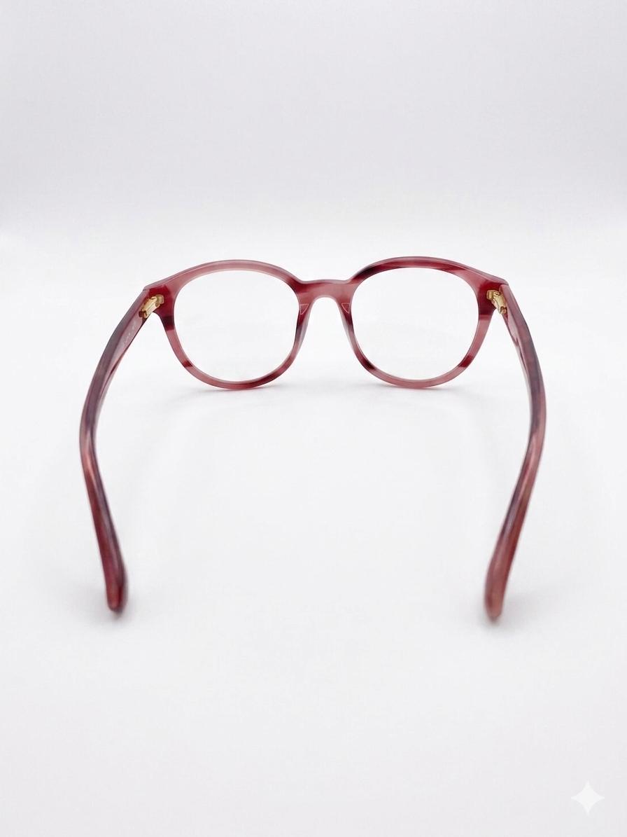 Monturas Oftálmicas Calvin Klein – Elegancia Transparente en Tono Borgoña
