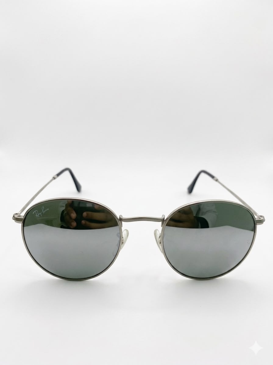 Lentes de Sol Ray-Ban Estilo Redondo Clásico con Montura Metálica.