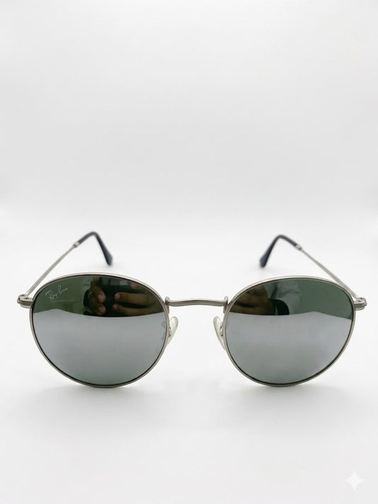 Lentes de Sol Ray-Ban Estilo Redondo Clásico con Montura Metálica.