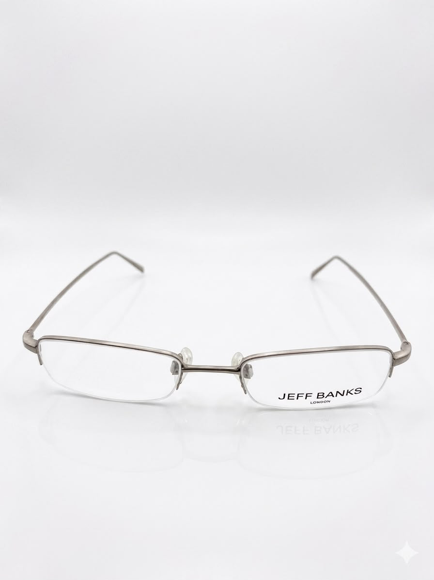 Lentes oftálmicos Jeff Banks London, armazón metálico de acero inoxidable.