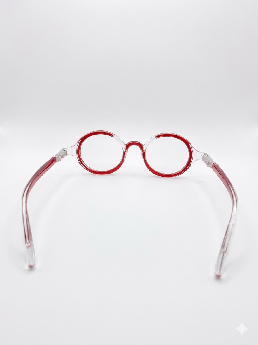 Gafas de lectura redondas estilo retro con montura transparente y detalles en rojo