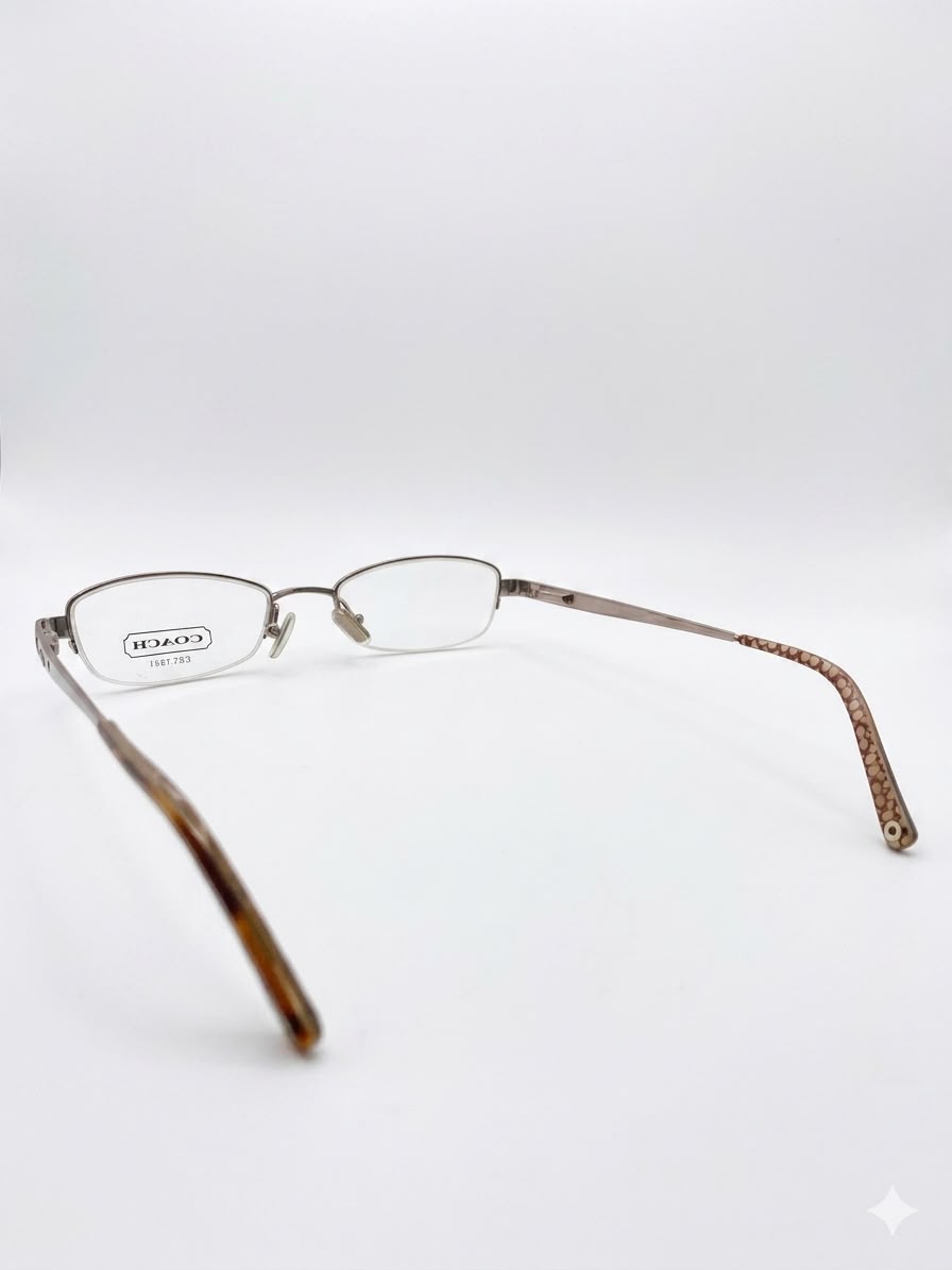 Gafas graduadas Coach con detalles decorativos en las varillas