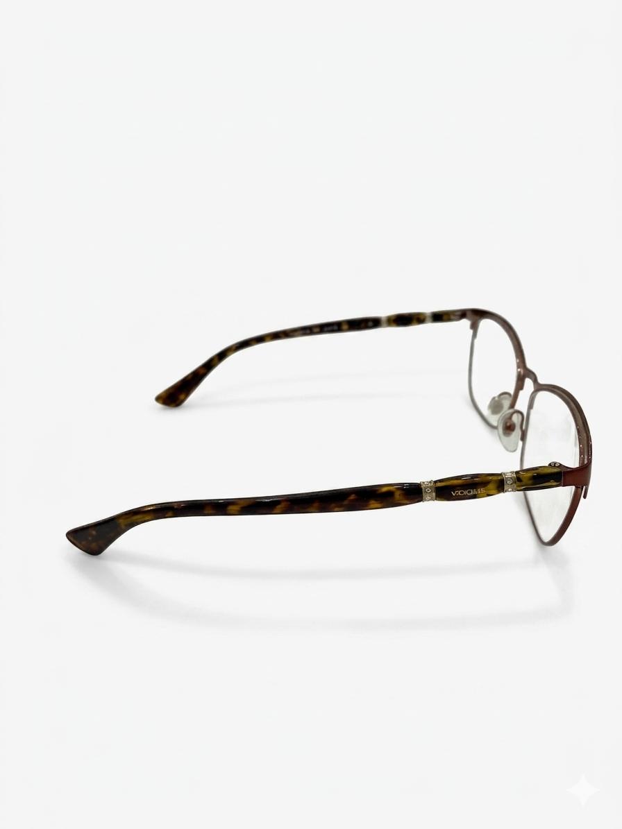Lentes Oftálmicos Vogue con Armazón Metálico y Varillas en Carey