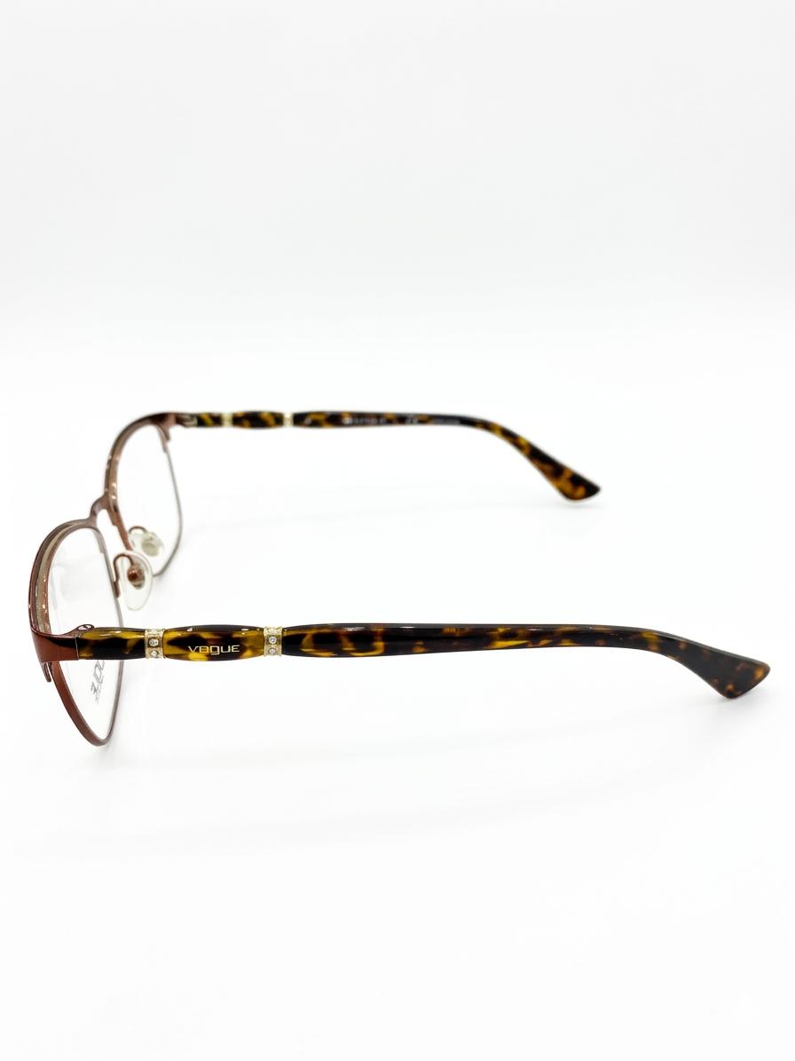 Lentes Oftálmicos Vogue con Armazón Metálico y Varillas en Carey