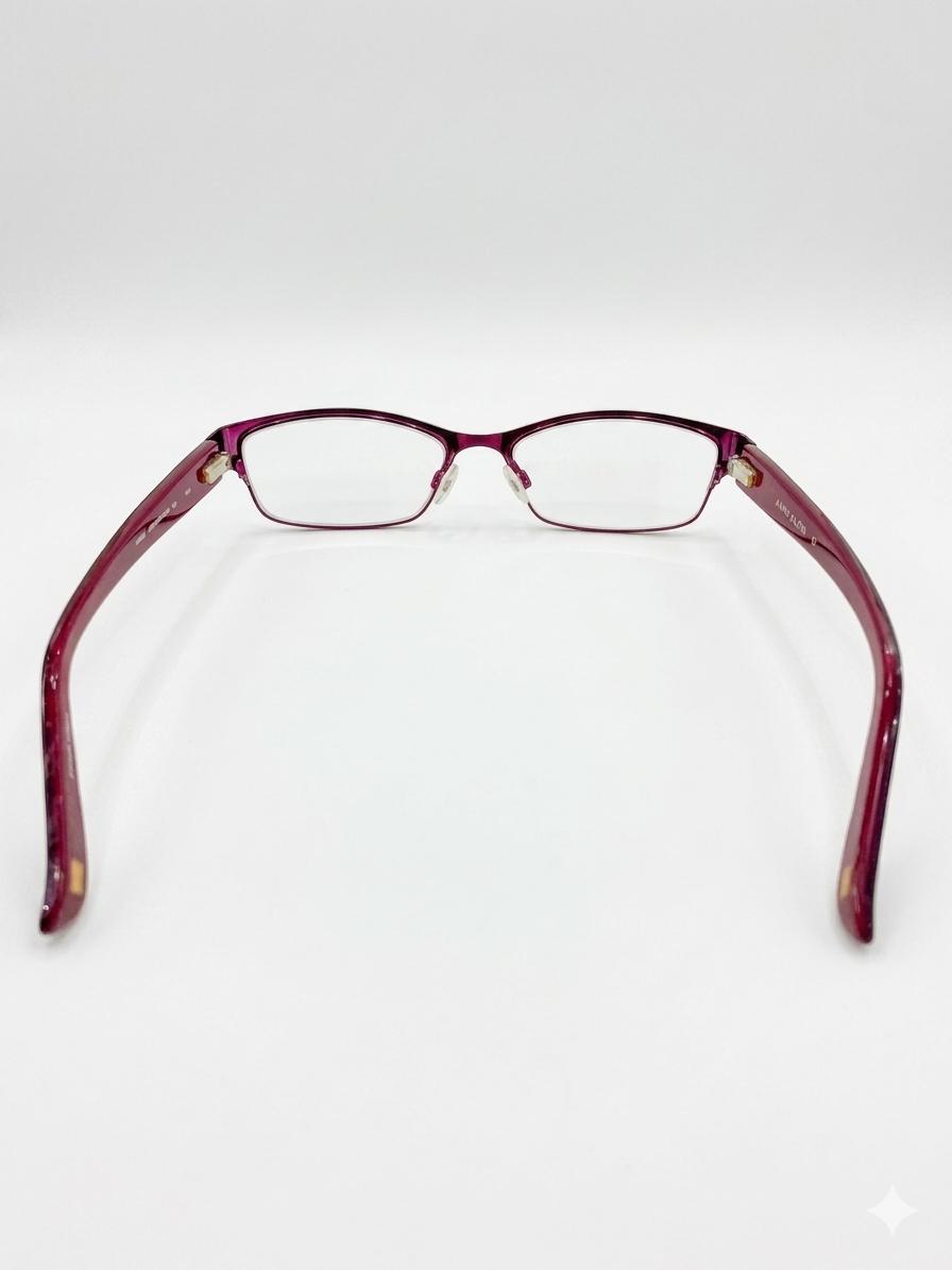 Lentes graduados Anne Klein de diseño clásico en tono borgoña.