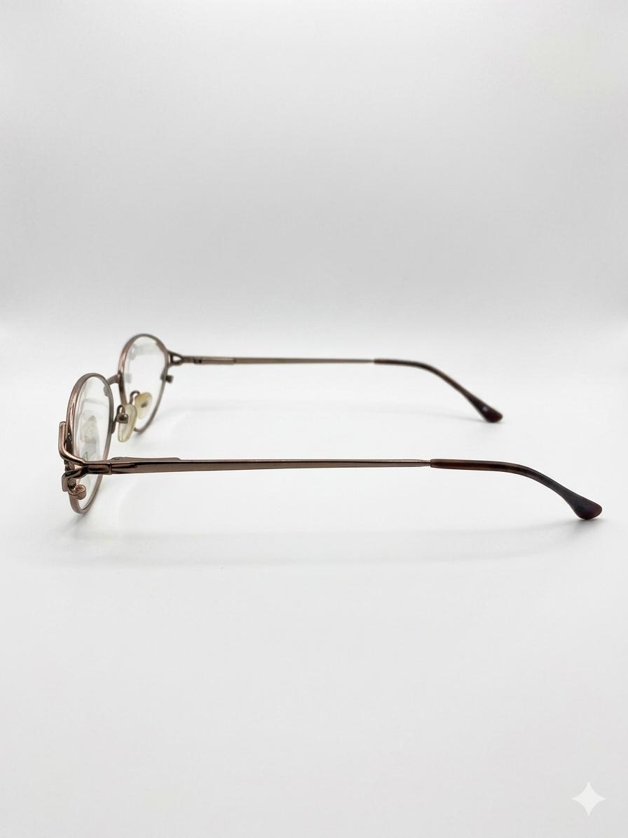Montura Óptica Elegante y Minimalista en Tono Bronce