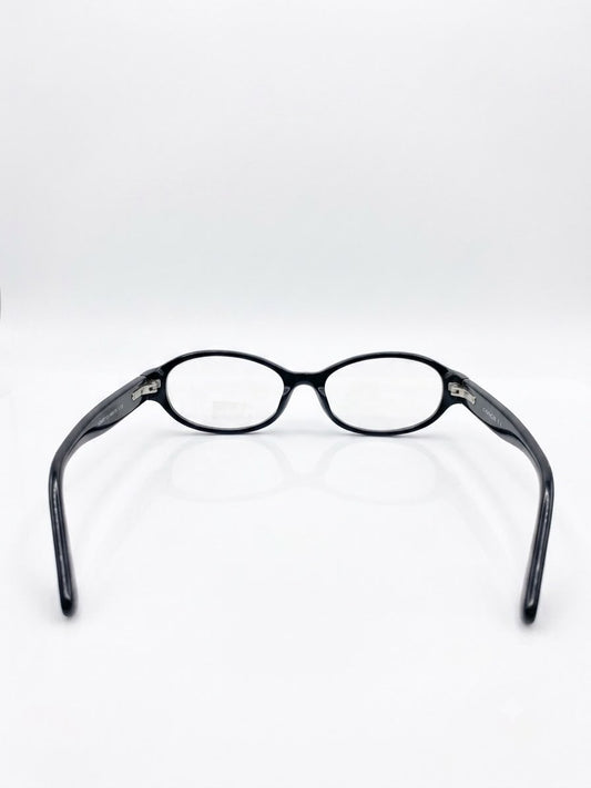 Lentes Ópticos Coach - Negros con Patillas Estampadas